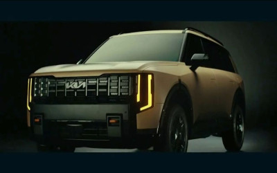 What is the background song in the Kia Telluride X-Pro ad?