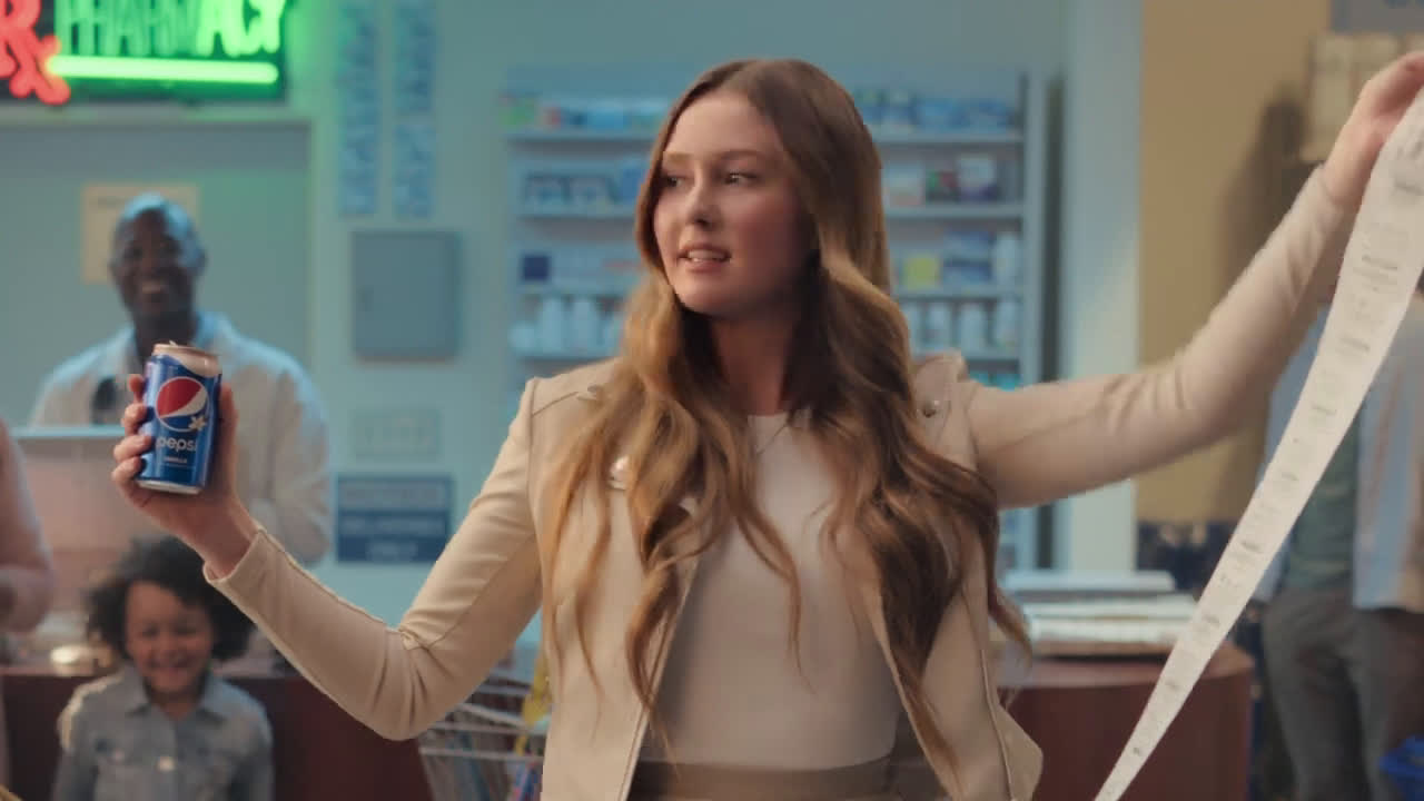  girl dancing with a store receipt