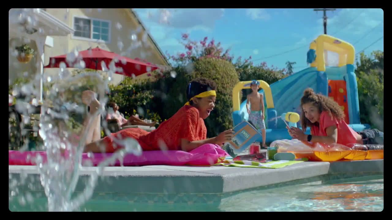  boy jumping in the pool