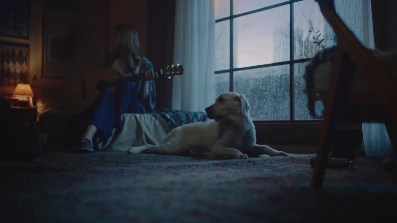  Girl playing music to her dog