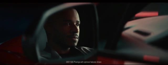  Toll booth operator in the middle of a car race