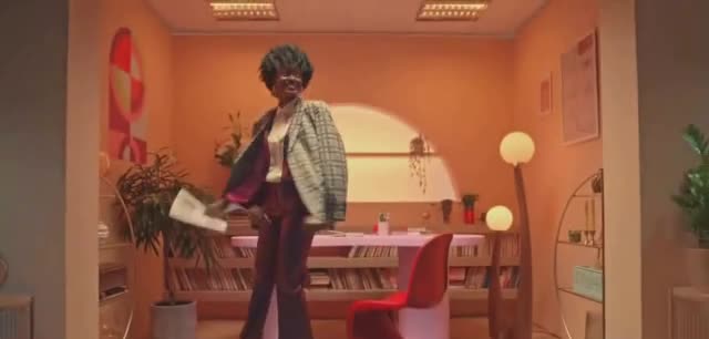  Man drinking a cup of tea in the living room