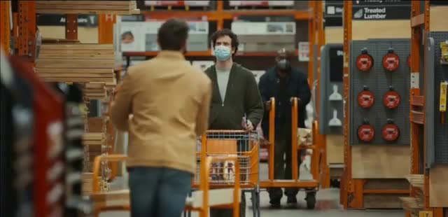  Man using the map of his shopping mall on his cell phone