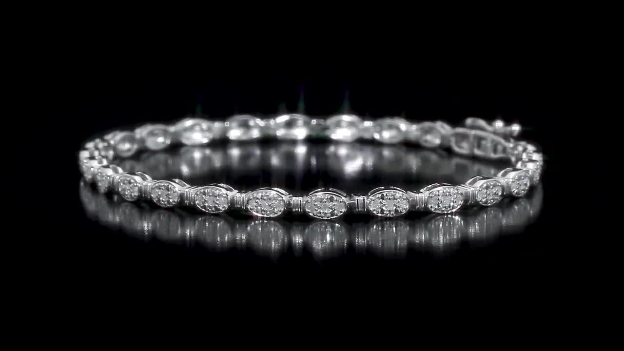 REEDS Jewelers 1/2ctw Oval-Shaped Diamond Cluster Sterling Silver 