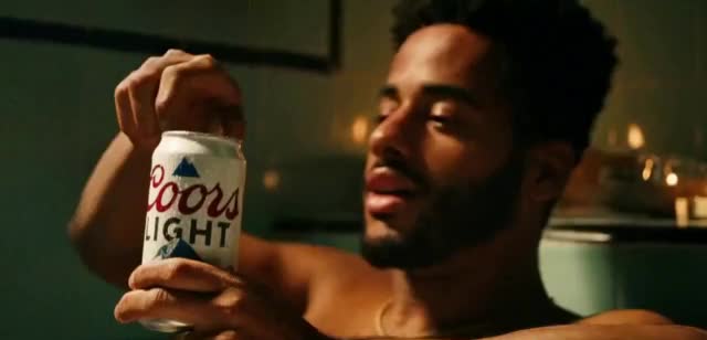 Coors Light relaxing in the bathtub