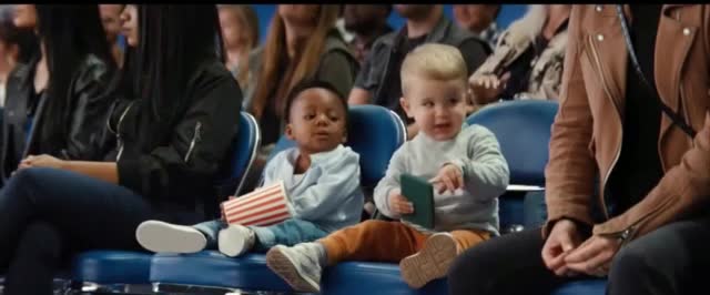 E*TRADE baby on the phone