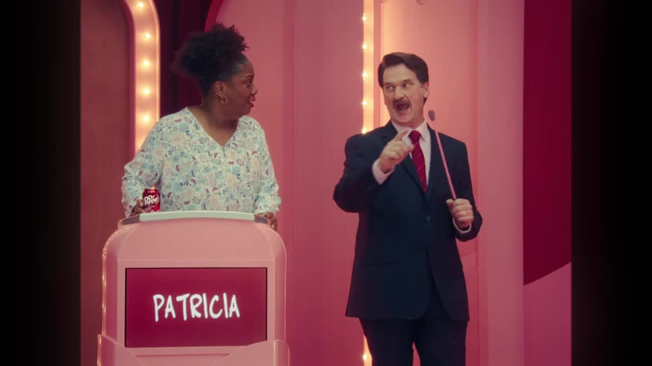  Presenter shows the new Dr Pepper