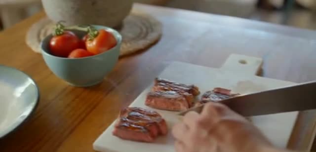 Ziploc Couple cooking healthy meat together