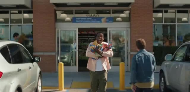Arco Woman waiting while pumping gas into her car