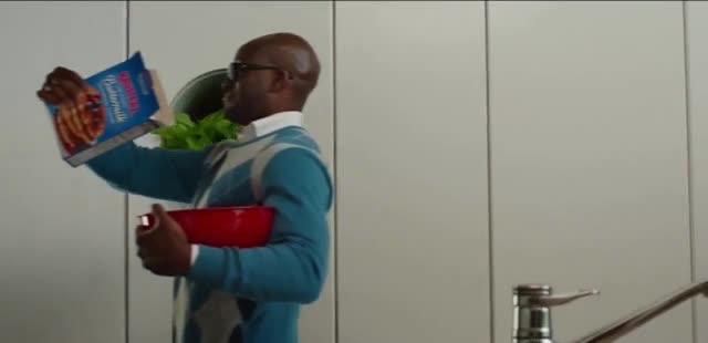 Krusteaz Children watching a clown making a doll with a balloon