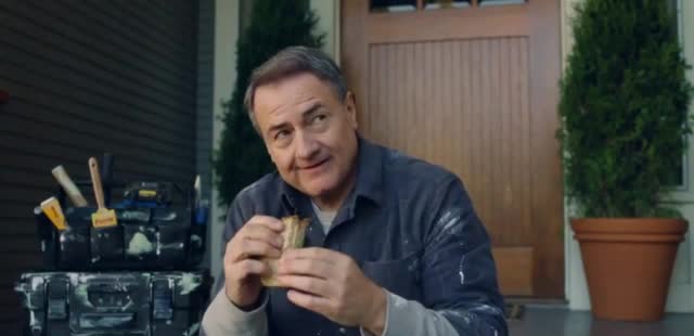 Valspar Man is interrupted while eating in front of his house