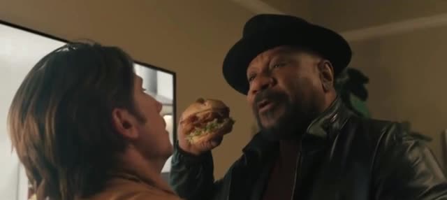  the man in the black hat