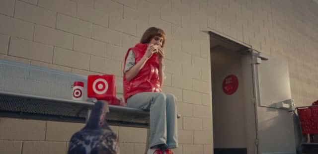  Kristen Wiig talking to a pigeon