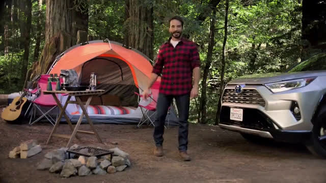  man driving a car through the woods