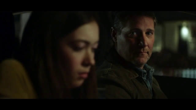  man in car going through deserted streets