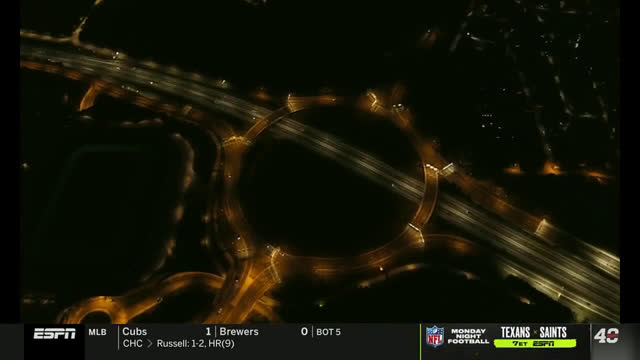  woman watching her watch in the car