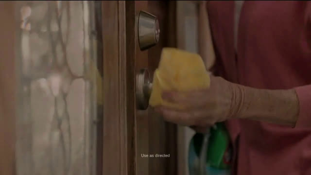  Mother cleaning the house