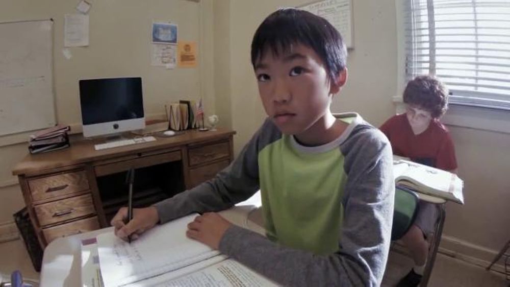 Meaning behind the Khan Academy learning access commercial