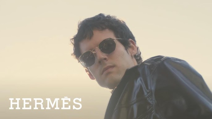 Who appears in the Hermès luxury lifestyle ad?