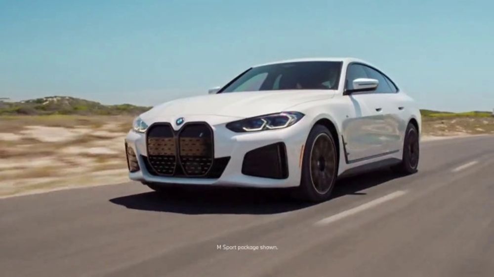 What song plays in the BMW electric vehicle commercial?