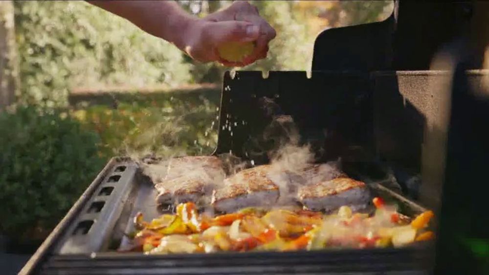 Who appears in the Weber Grills Master of the Flame commercial?
